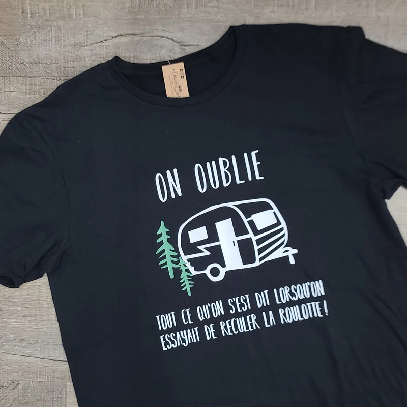 T-shirt - UNISEXE - Noir - On oublie tout ce qu'on s'est dit lorsqu'on essayait de reculer la roulotte - LARGE (Impression en blanc)
