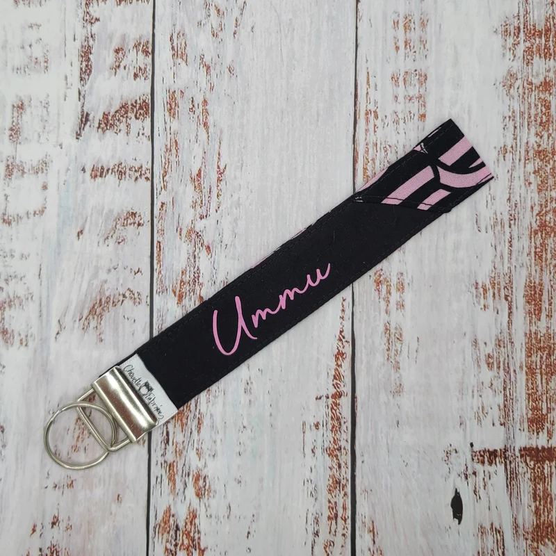 Porte-clé - PERSONNALISÉ - Dragonne - Poignet - Cercles roses et noirs - Bande noire