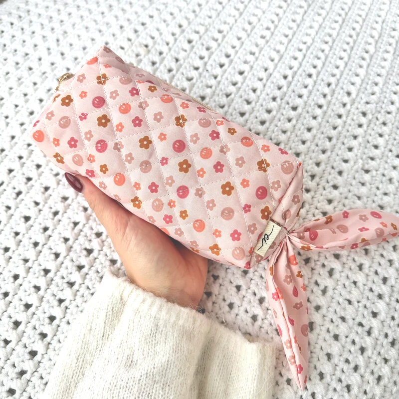 Trousse (Sourires et fleurs neutres)