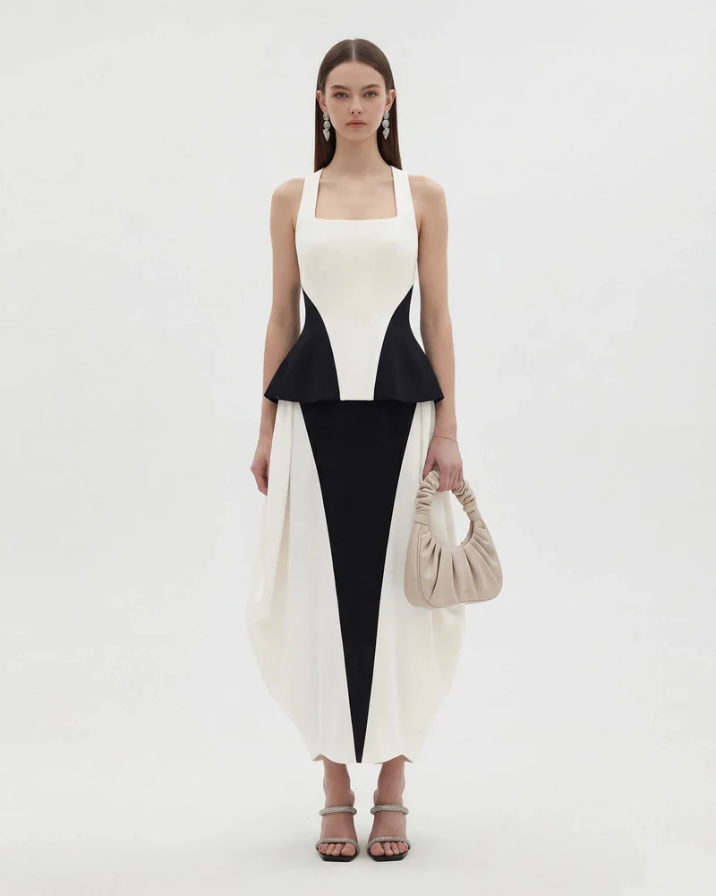 Top peplum monochrome à empiècements et col carré - Noir