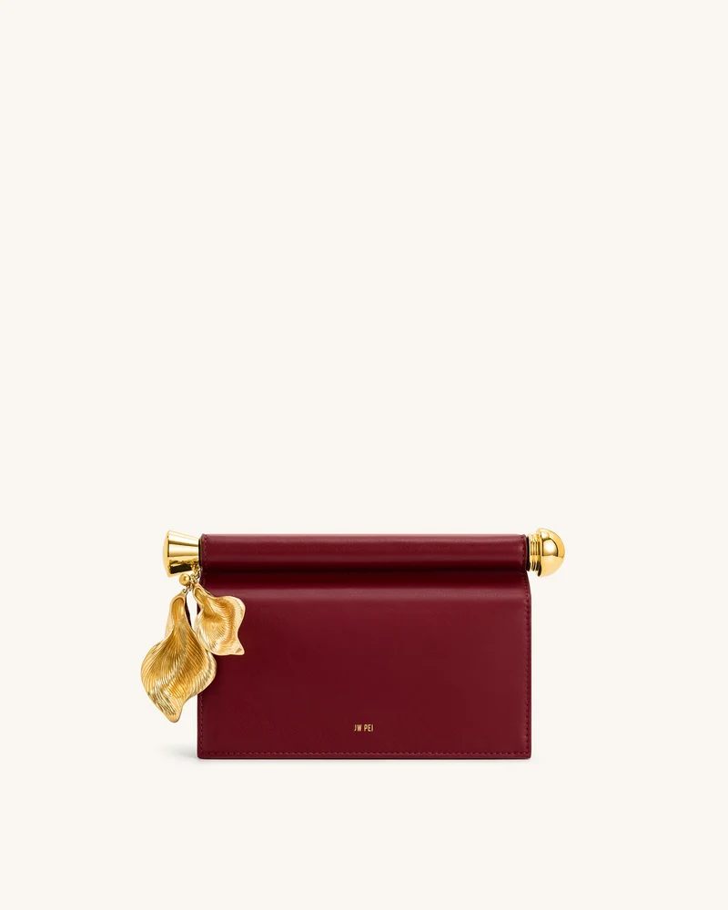 Pochette Holly ornée d'un pendentif en métal - Bordeaux